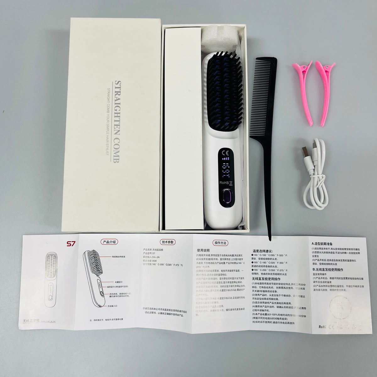 Contenido de la caja del cepillo GlowBrush: cepillo, cable USB, peine y accesorios